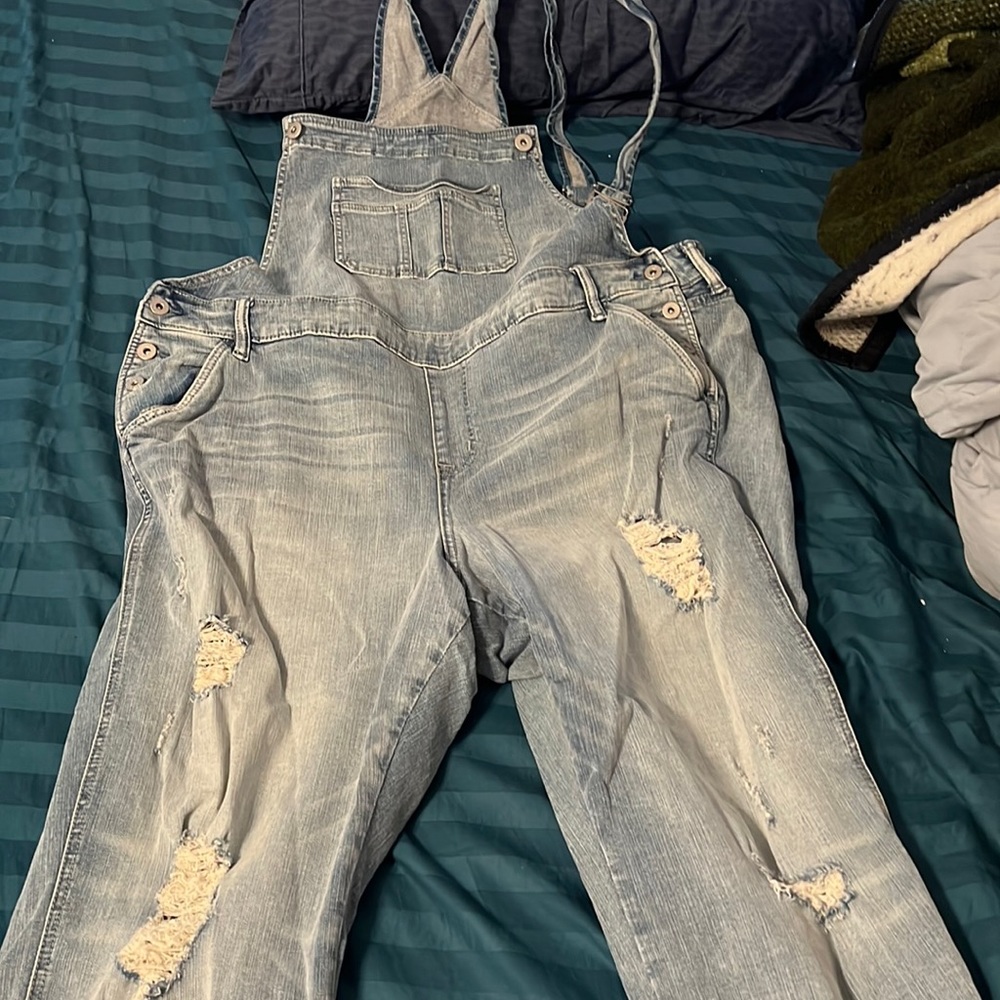 Torrid ripped Jean overalls